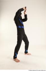 Man Young Athletic Fighting with sword Standing poses Casual Asian